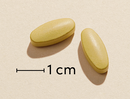 Biosym Omnimin 300 Tabl Tablet actual size (scale bar: 1 cm)