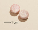 Biosym OmniMini Multi 150 Tyggetabl Chewable tablet actual size (scale bar: 1 cm)