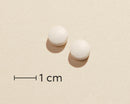 Biosym OmniSelen3 100 Tabl Tablet actual size (scale bar: 1 cm)