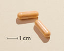Biosym OmniVita B Total 100 Kaps Actual capsule size (scale: 1 cm)