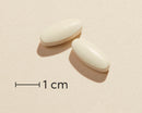 Biosym OmniVita C 160 Tabl Tablet actual size (scale bar: 1 cm)